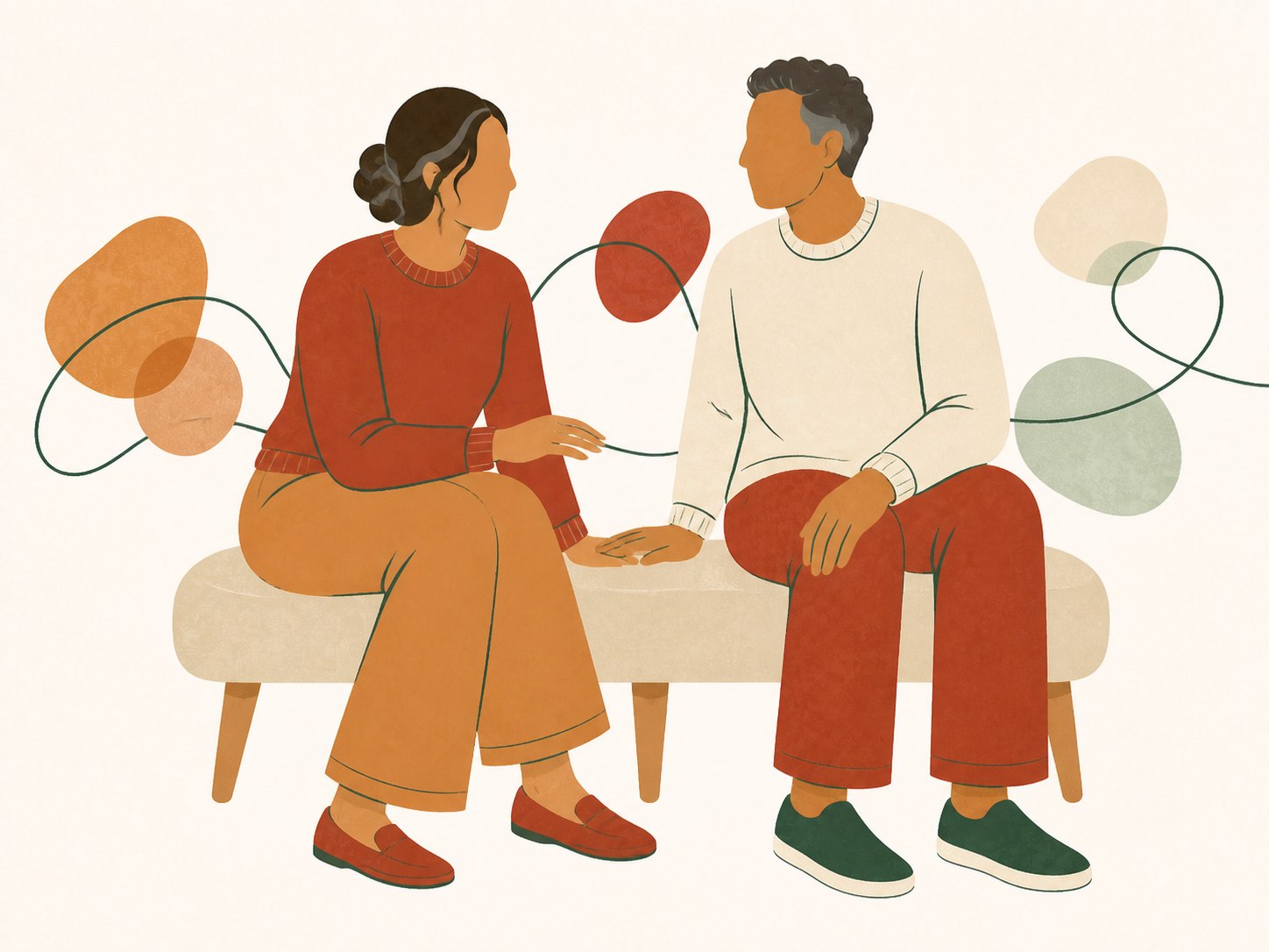 Two long-time partners sitting close together as an abstract line connects shared memories with what comes next